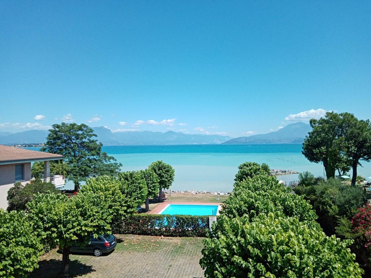 Casa Lugana 19 - Monolocale Con Piscina Direttamente A Lago シルミオーネ エクステリア 写真